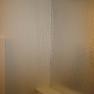 Window and outside wall covered with styrofoam board