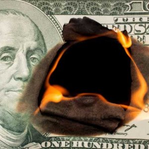 Cash Burning - Getty Images