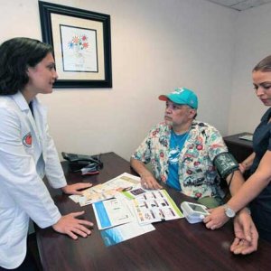 Doctor Michelle Weiner with Patient - Roberto Koltun