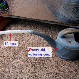 Watering can with hose.jpg