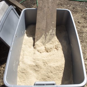 04-Adding-the-rice-bran-to-the-bin-683x1024-1.jpg