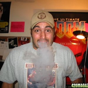 Joe Rogan exhaling