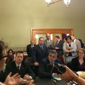 Iowa state Sens. Joe Bolkcom (in profile), Charles Schneider and Matt McCoy