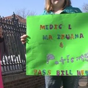 Girl with MMJ Sign