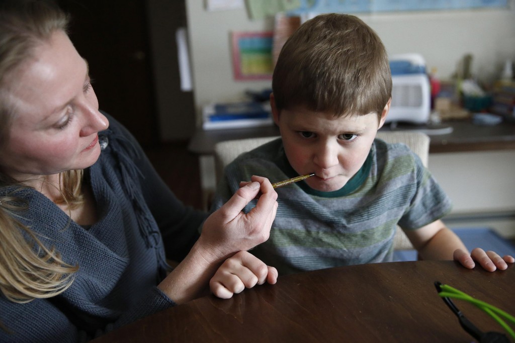 boy taking cannabis oil