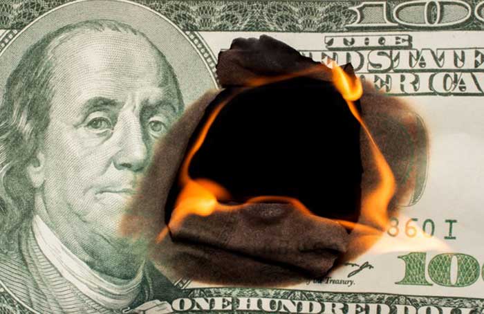 Cash Burning - Getty Images