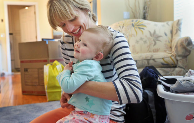 Genny Jessee, plays with her 23-month old daughter June Jessee