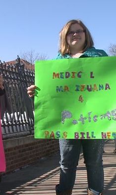 Girl with MMJ Sign