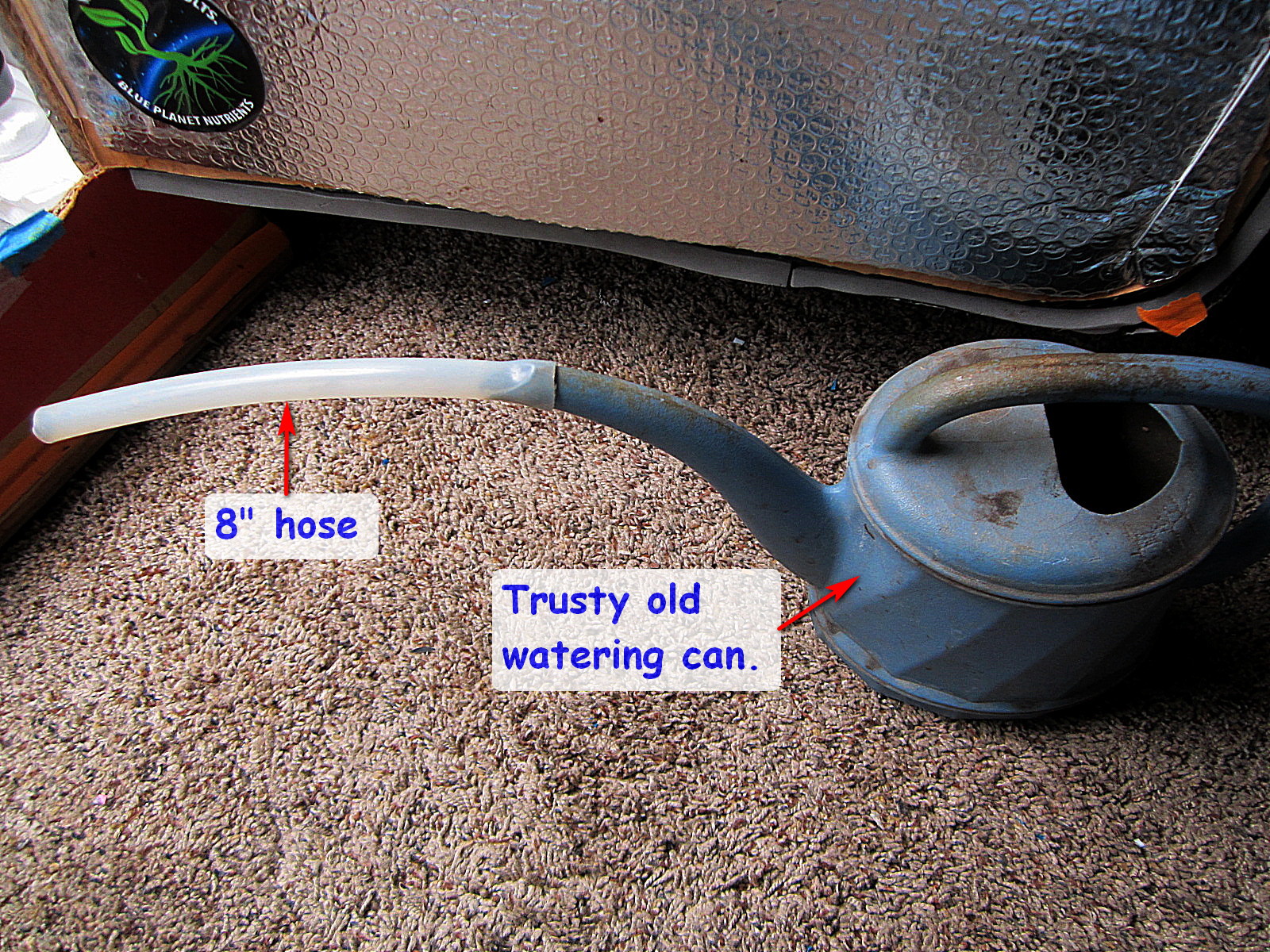 Watering can with hose.jpg